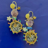 Boucles d'oreile avec image de tête d'hibou