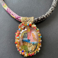 Necklace with glass pendent representing a scene of the garden of delights by Hieronymus Bosch