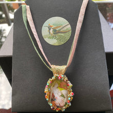 Load image into Gallery viewer, Necklace with pendent representing a detail of the Garden of Earthly Delights painted by Hieronymus Bosh
