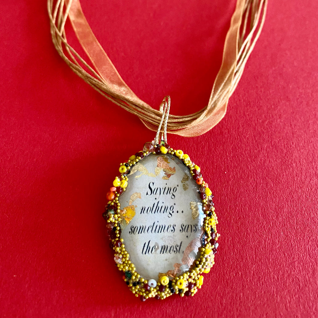 Pendent with quote of Emily Dickinson