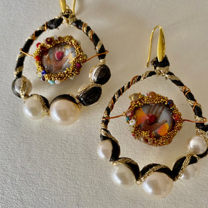 Earrings with pearls and images of sacred heart