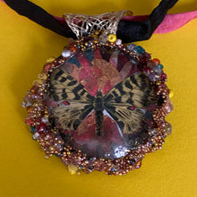 Load image into Gallery viewer, Necklace with glass pendent with  beautiful yellow butterfly and silk ribbon
