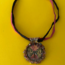 Load image into Gallery viewer, Necklace with glass pendent with  beautiful yellow butterfly and silk ribbon
